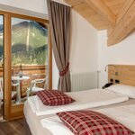  Foto von Doppelzimmer - Dolomiti Mansarda